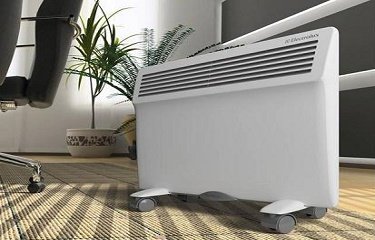 Конвекторний обігрівач Electrolux в інтер’єрі приміщення Конвектор Electrolux у приміщені